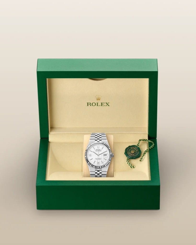 Rolex Land-Dweller Watch — Textured White Honeycomb Dial with Integrated Flat Jubilee-Style Bracelet