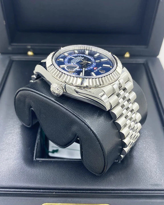 Rolex Sky-Dweller Watch — Vibrant Blue Dial with Oystersteel Case & Fluted White Gold Bezel