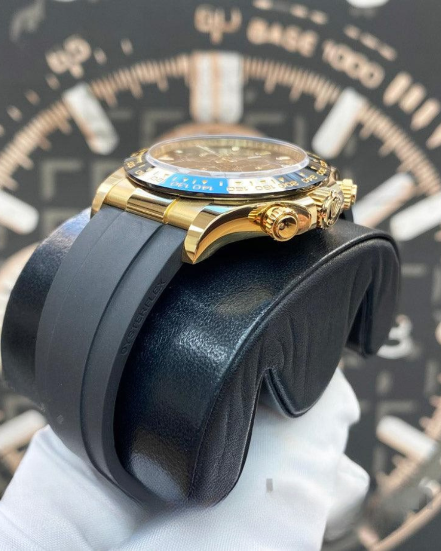 Rolex Cosmograph Daytona Watch — 18K Yellow Gold with Champagne Dial & Black Strap