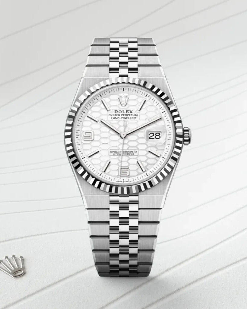 Rolex Land-Dweller Watch — Textured White Honeycomb Dial with Integrated Flat Jubilee-Style Bracelet