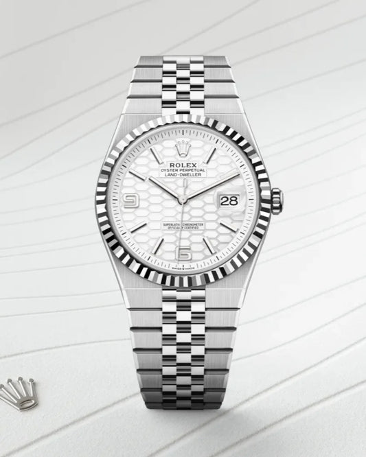 Rolex Land-Dweller Watch — Textured White Honeycomb Dial with Integrated Flat Jubilee-Style Bracelet
