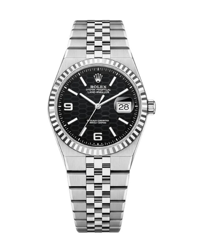 Rolex Land-Dweller Watch — Black Patterned Dial with Arabic Numerals and Fluted Bezel