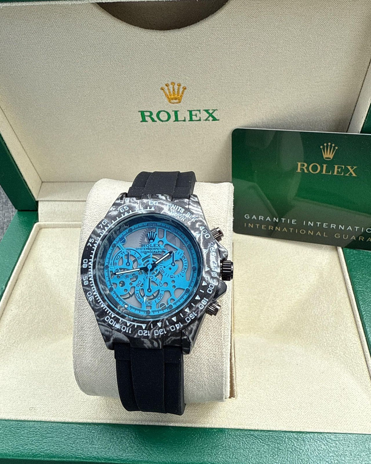 Rolex Cosmograph Daytona Style Watch — Carbon Case with Blue Skeleton Dial & Black Strap