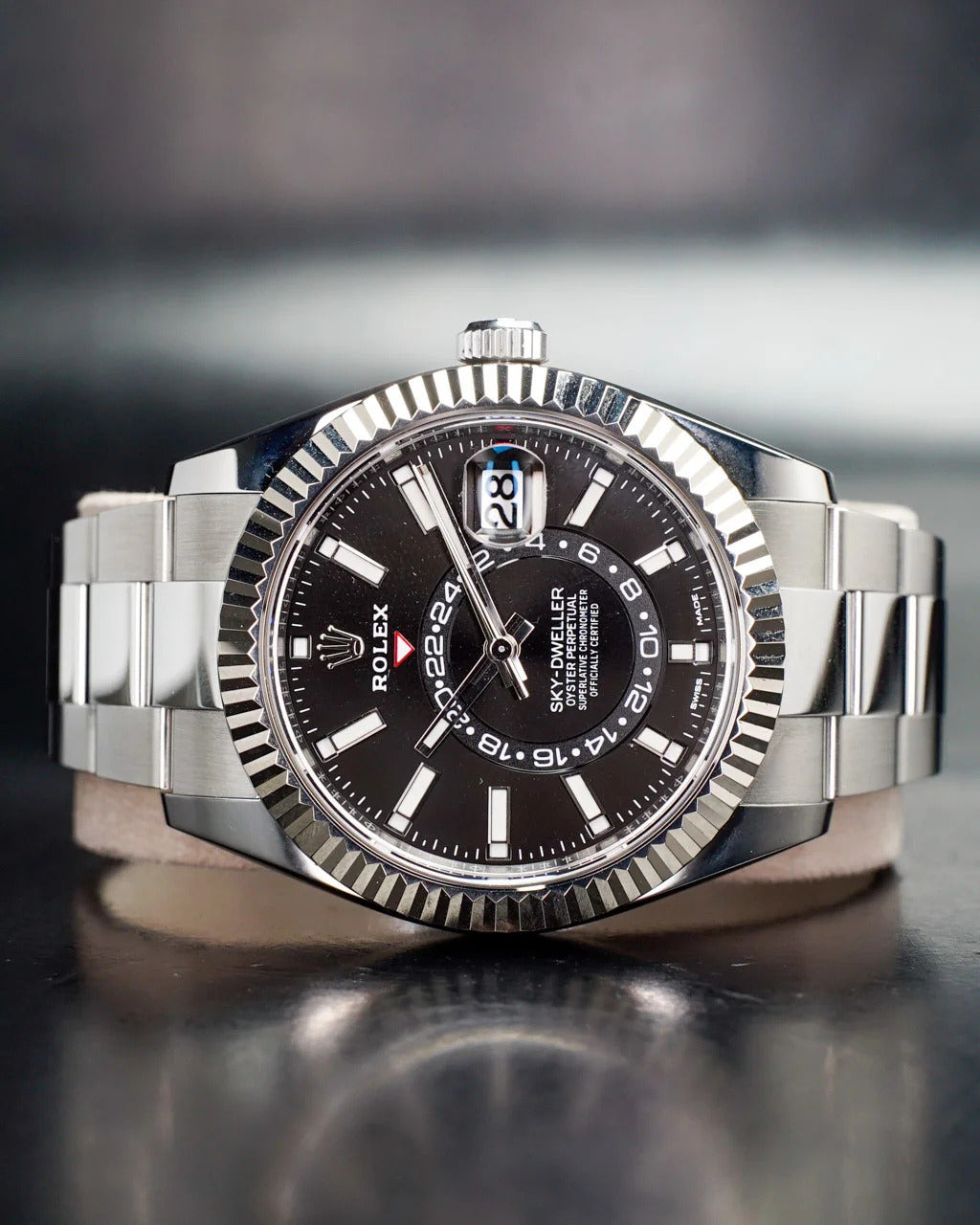 Rolex Sky-Dweller Watch — Bright Black Dial with Oystersteel Case & 18K White Gold Fluted Bezel