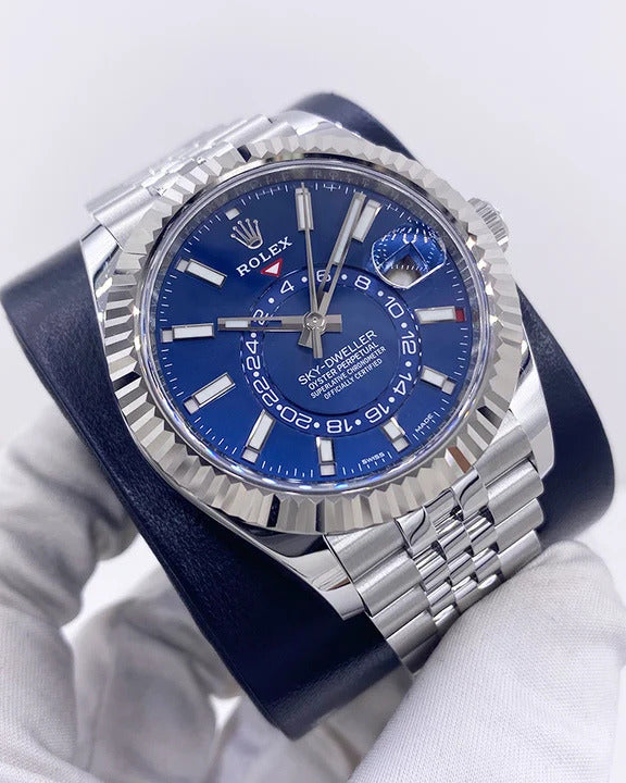 Rolex Sky-Dweller Watch — Vibrant Blue Dial with Oystersteel Case & Fluted White Gold Bezel