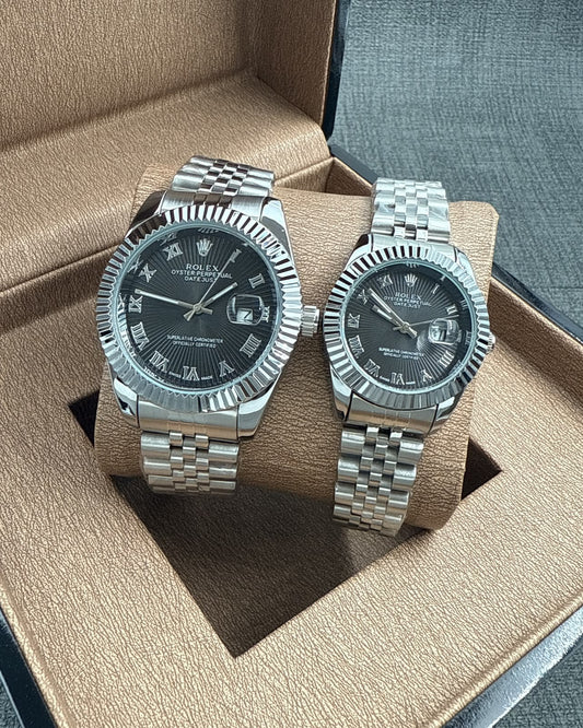 Rolex Datejust Couple Watch Set — Silver-Tone with Dark Dials, Roman Numerals & Jubilee Bracelets