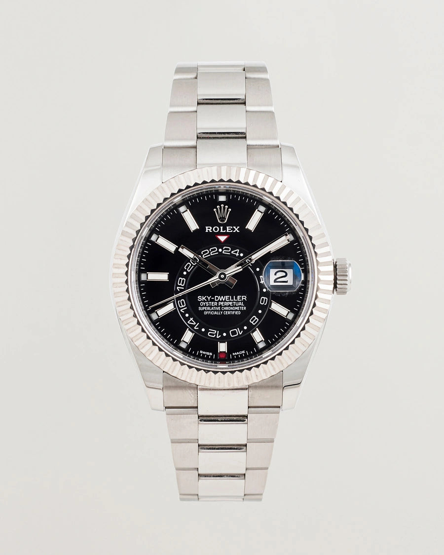 Rolex Sky-Dweller Watch — Bright Black Dial with Oystersteel Case & 18K White Gold Fluted Bezel